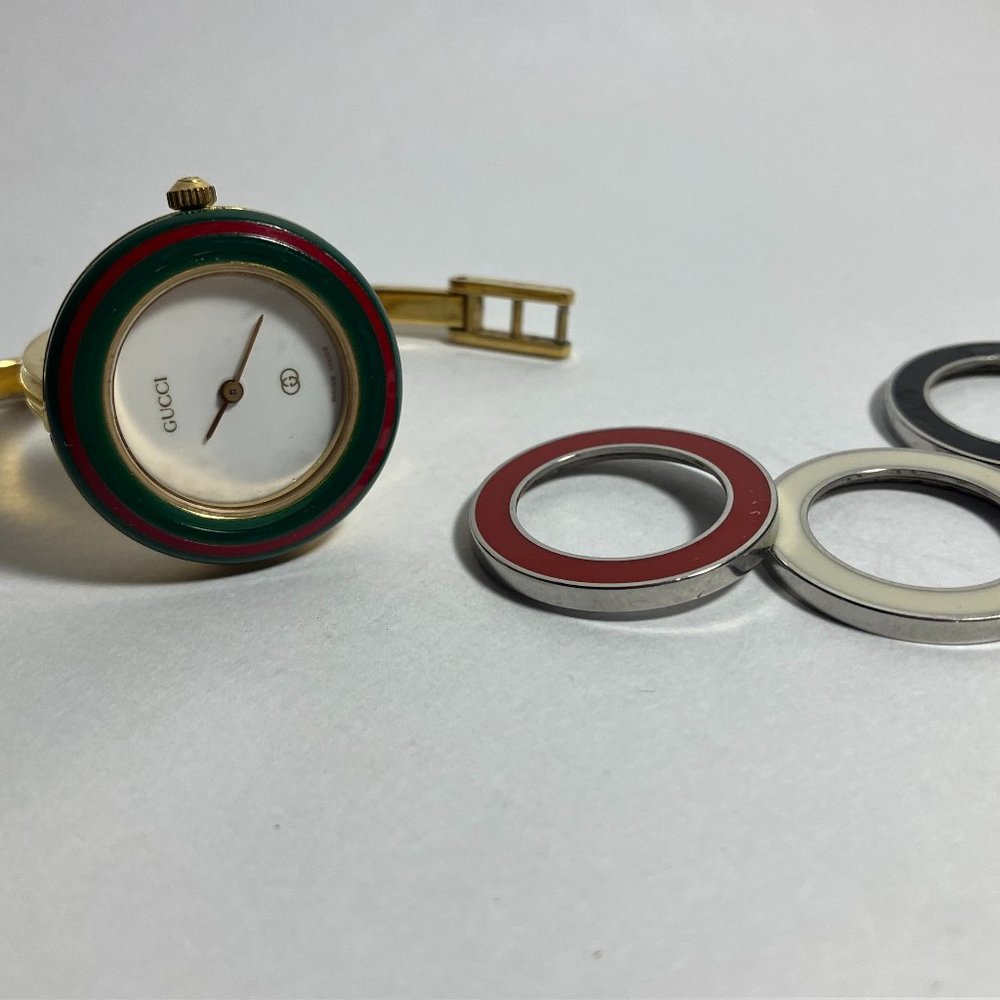 Authentic Gucci Interchangeable Watch with 4 color rings.